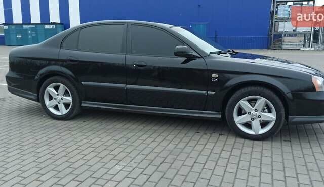 Черный Шевроле Эванда, объемом двигателя 2.49 л и пробегом 298 тыс. км за 3999 $, фото 3 на Automoto.ua