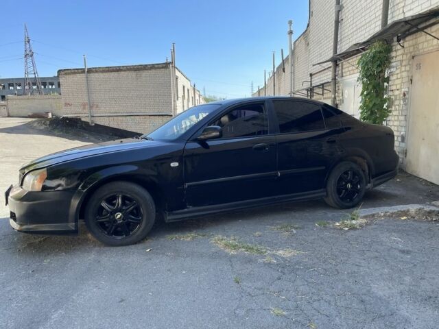 Черный Шевроле Эванда, объемом двигателя 2.5 л и пробегом 290 тыс. км за 1999 $, фото 3 на Automoto.ua