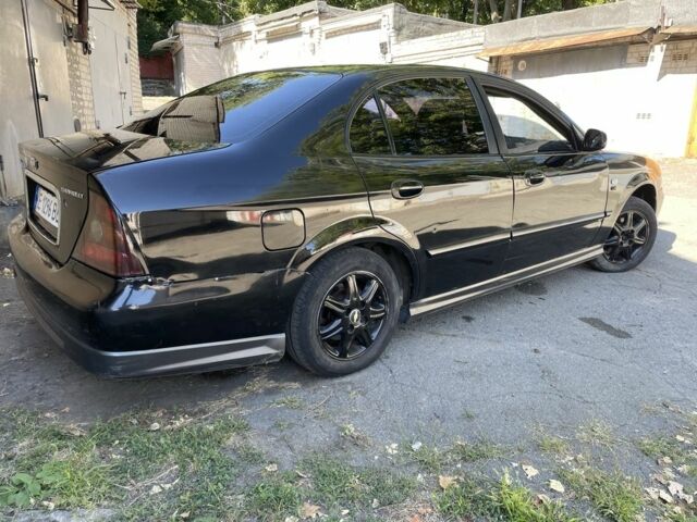 Черный Шевроле Эванда, объемом двигателя 2.5 л и пробегом 290 тыс. км за 1999 $, фото 2 на Automoto.ua