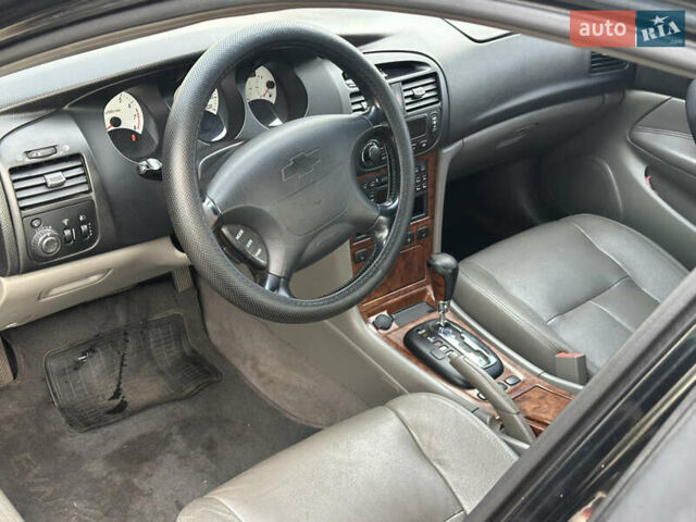 Черный Шевроле Эванда, объемом двигателя 2.5 л и пробегом 165 тыс. км за 3499 $, фото 8 на Automoto.ua