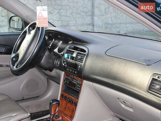 Черный Шевроле Эванда, объемом двигателя 0 л и пробегом 170 тыс. км за 4500 $, фото 9 на Automoto.ua