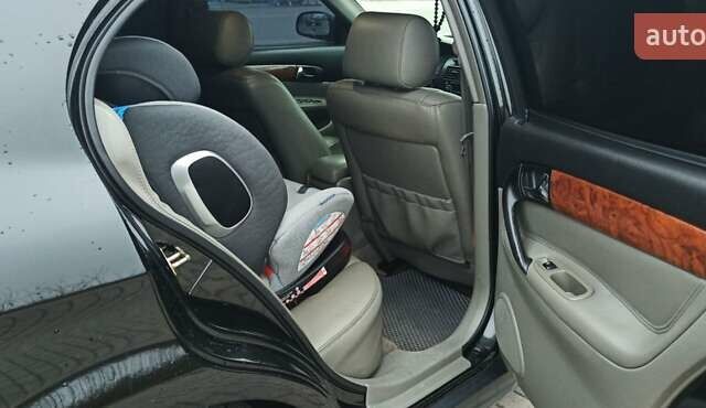 Черный Шевроле Эванда, объемом двигателя 2.49 л и пробегом 298 тыс. км за 3999 $, фото 12 на Automoto.ua