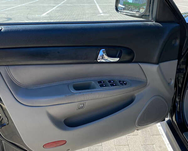 Черный Шевроле Эванда, объемом двигателя 2 л и пробегом 266 тыс. км за 3600 $, фото 6 на Automoto.ua