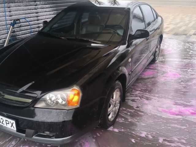 Черный Шевроле Эванда, объемом двигателя 2 л и пробегом 180 тыс. км за 3000 $, фото 4 на Automoto.ua