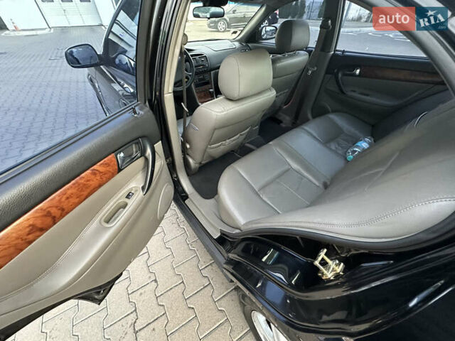 Черный Шевроле Эванда, объемом двигателя 2.5 л и пробегом 165 тыс. км за 3499 $, фото 16 на Automoto.ua