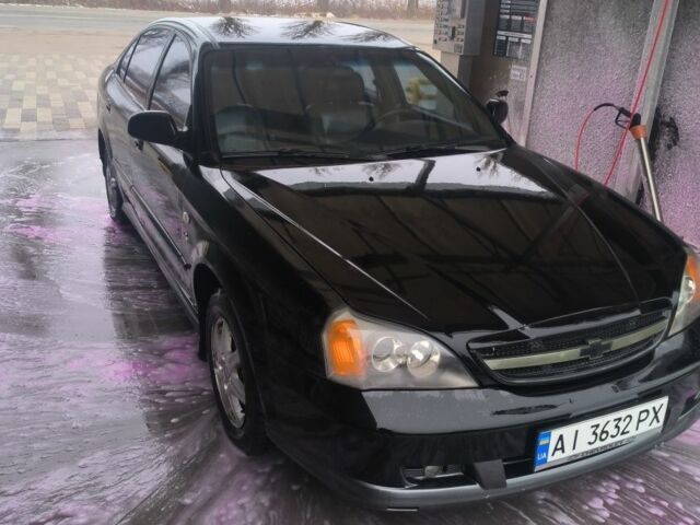 Черный Шевроле Эванда, объемом двигателя 2 л и пробегом 180 тыс. км за 3000 $, фото 7 на Automoto.ua