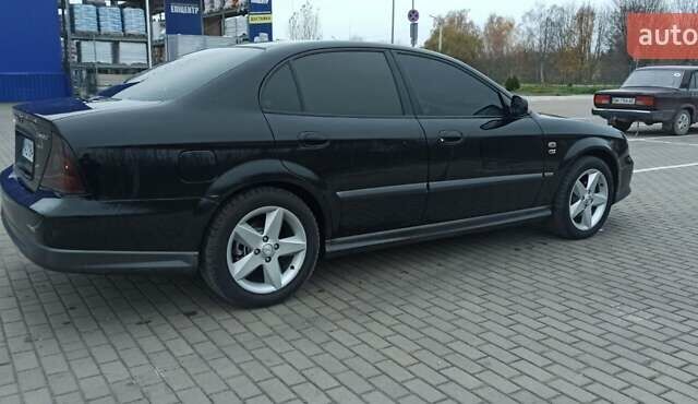 Черный Шевроле Эванда, объемом двигателя 2.49 л и пробегом 298 тыс. км за 3999 $, фото 4 на Automoto.ua