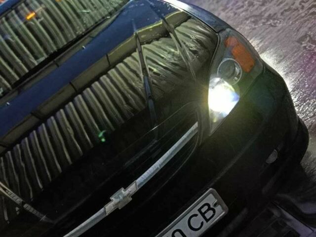 Чорний Шевроле Еванда, об'ємом двигуна 2 л та пробігом 36 тис. км за 3600 $, фото 6 на Automoto.ua