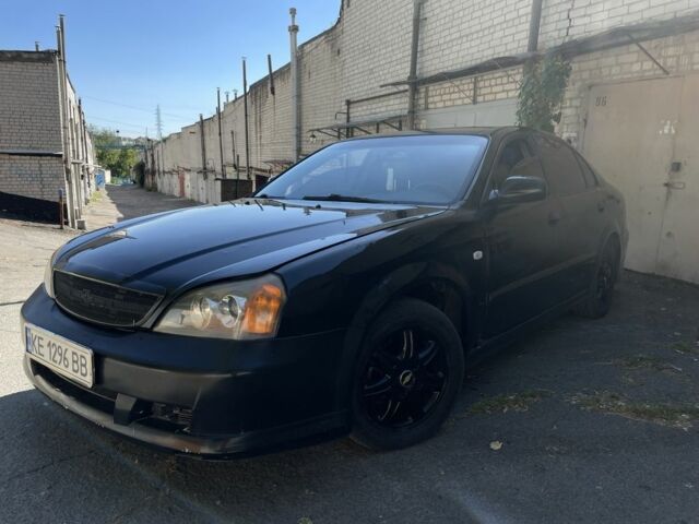 Черный Шевроле Эванда, объемом двигателя 2.5 л и пробегом 290 тыс. км за 1999 $, фото 1 на Automoto.ua