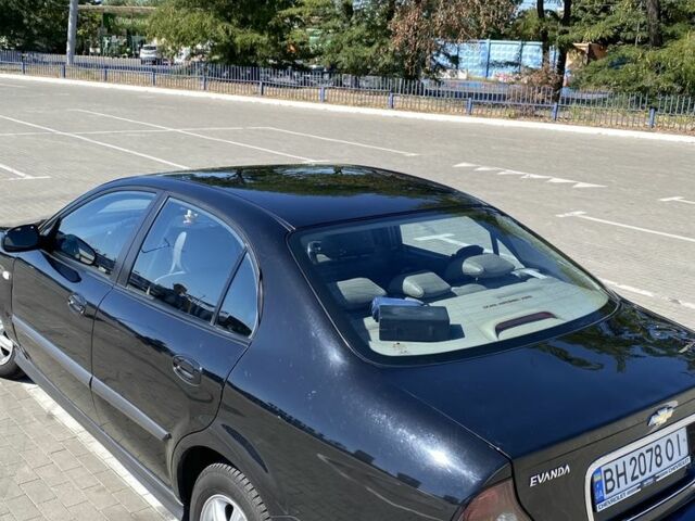 Черный Шевроле Эванда, объемом двигателя 2 л и пробегом 266 тыс. км за 3600 $, фото 12 на Automoto.ua