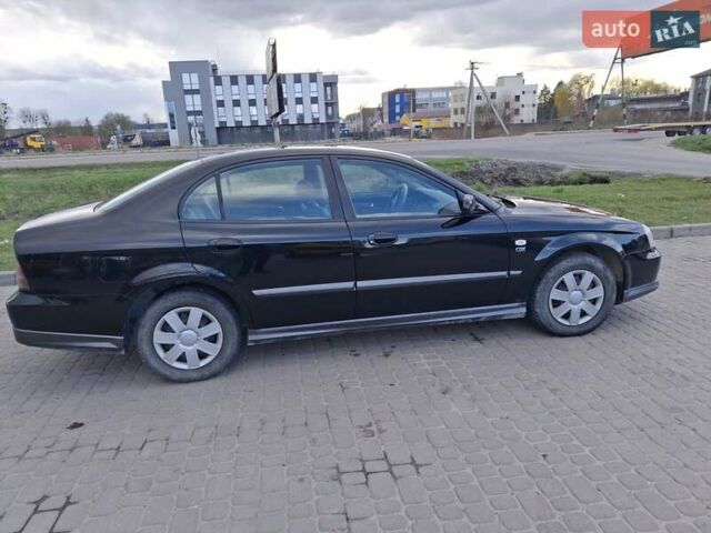 Черный Шевроле Эванда, объемом двигателя 0 л и пробегом 170 тыс. км за 4500 $, фото 2 на Automoto.ua