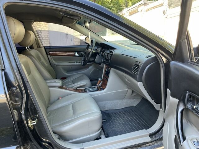 Черный Шевроле Эванда, объемом двигателя 2.5 л и пробегом 290 тыс. км за 1999 $, фото 10 на Automoto.ua