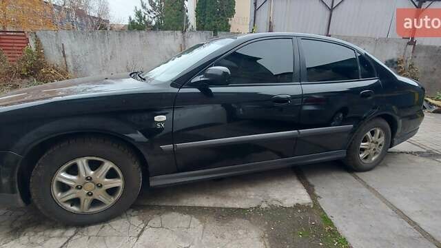 Черный Шевроле Эванда, объемом двигателя 2 л и пробегом 220 тыс. км за 4000 $, фото 3 на Automoto.ua