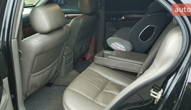 Черный Шевроле Эванда, объемом двигателя 2.49 л и пробегом 298 тыс. км за 3999 $, фото 11 на Automoto.ua