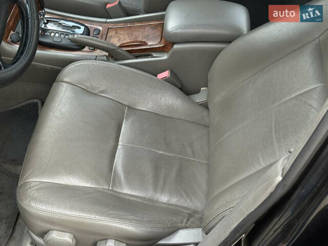 Черный Шевроле Эванда, объемом двигателя 2.5 л и пробегом 165 тыс. км за 3499 $, фото 12 на Automoto.ua