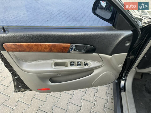 Черный Шевроле Эванда, объемом двигателя 2.5 л и пробегом 165 тыс. км за 3499 $, фото 10 на Automoto.ua