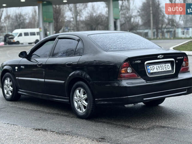 Чорний Шевроле Еванда, об'ємом двигуна 2 л та пробігом 303 тис. км за 2950 $, фото 5 на Automoto.ua