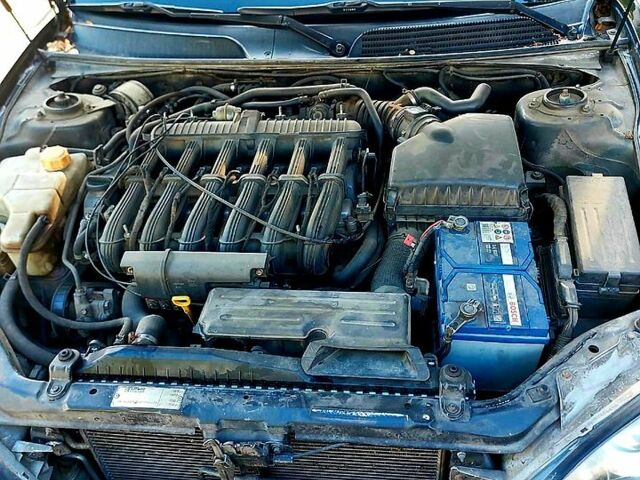 Черный Шевроле Эванда, объемом двигателя 2.5 л и пробегом 142 тыс. км за 4000 $, фото 5 на Automoto.ua