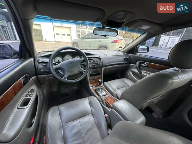Черный Шевроле Эванда, объемом двигателя 2.5 л и пробегом 165 тыс. км за 3499 $, фото 13 на Automoto.ua