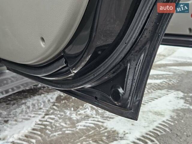 Чорний Шевроле Еванда, об'ємом двигуна 2 л та пробігом 250 тис. км за 3500 $, фото 28 на Automoto.ua