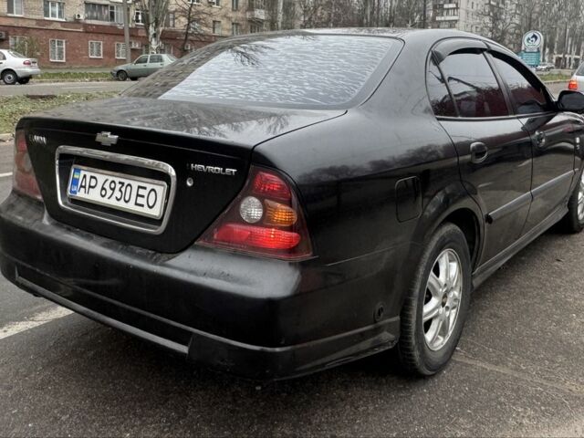 Чорний Шевроле Еванда, об'ємом двигуна 2 л та пробігом 303 тис. км за 2750 $, фото 2 на Automoto.ua