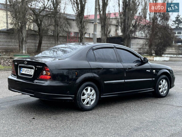 Чорний Шевроле Еванда, об'ємом двигуна 2 л та пробігом 303 тис. км за 2950 $, фото 3 на Automoto.ua