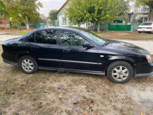 Шевроле Эванда 2006 в Вольнянске на Automoto.ua Черный Шевроле Эванда, объемом двигателя 2.5 л и пробегом 184 тыс. км за 4059 $, фото 4 на Automoto.ua