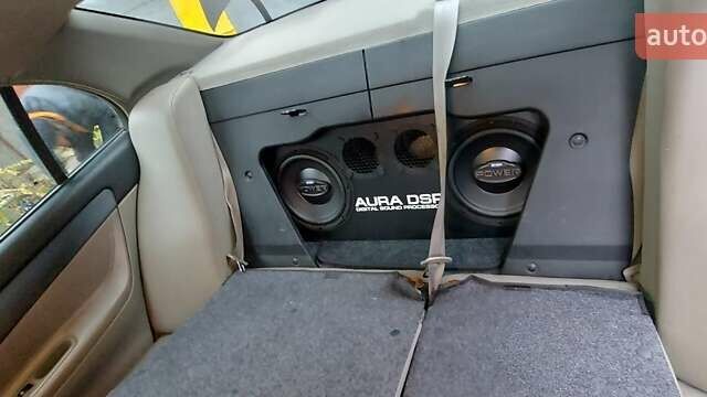 Черный Шевроле Эванда, объемом двигателя 2 л и пробегом 220 тыс. км за 4000 $, фото 15 на Automoto.ua