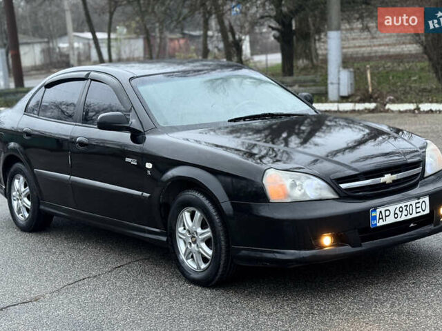 Чорний Шевроле Еванда, об'ємом двигуна 2 л та пробігом 303 тис. км за 2950 $, фото 2 на Automoto.ua
