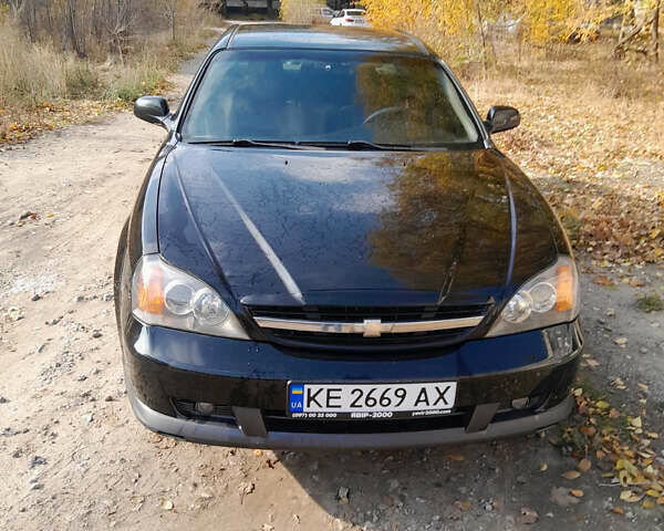 Черный Шевроле Эванда, объемом двигателя 2 л и пробегом 260 тыс. км за 4150 $, фото 14 на Automoto.ua