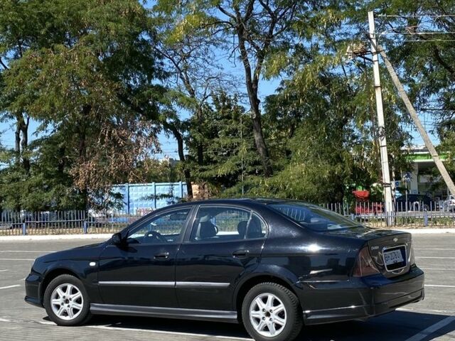 Черный Шевроле Эванда, объемом двигателя 2 л и пробегом 266 тыс. км за 3600 $, фото 3 на Automoto.ua