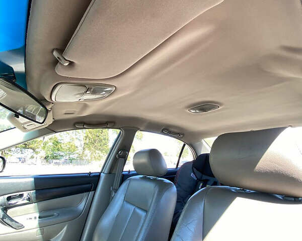 Черный Шевроле Эванда, объемом двигателя 2 л и пробегом 266 тыс. км за 3600 $, фото 5 на Automoto.ua