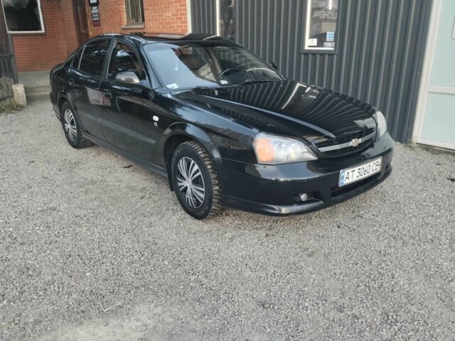 Чорний Шевроле Еванда, об'ємом двигуна 2 л та пробігом 36 тис. км за 3600 $, фото 3 на Automoto.ua