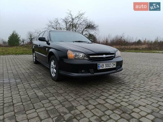 Чорний Шевроле Еванда, об'ємом двигуна 2 л та пробігом 178 тис. км за 5100 $, фото 2 на Automoto.ua