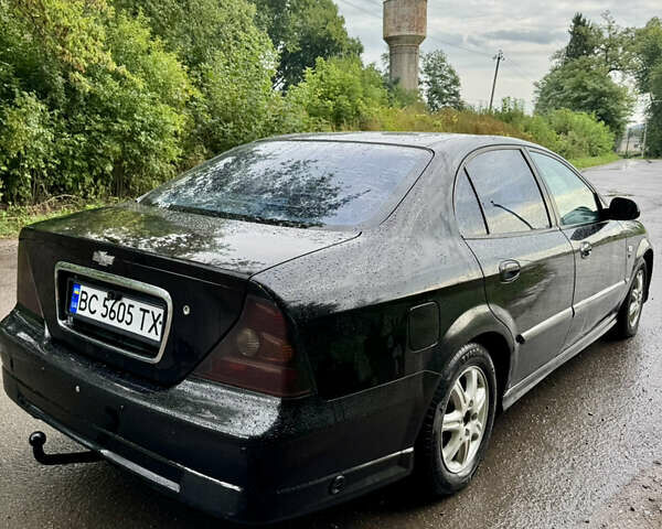 Черный Шевроле Эванда, объемом двигателя 2 л и пробегом 280 тыс. км за 3000 $, фото 5 на Automoto.ua