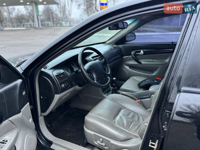 Чорний Шевроле Еванда, об'ємом двигуна 2 л та пробігом 303 тис. км за 2950 $, фото 8 на Automoto.ua
