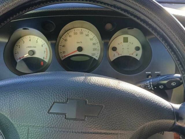 Черный Шевроле Эванда, объемом двигателя 2.5 л и пробегом 215 тыс. км за 3114 $, фото 9 на Automoto.ua