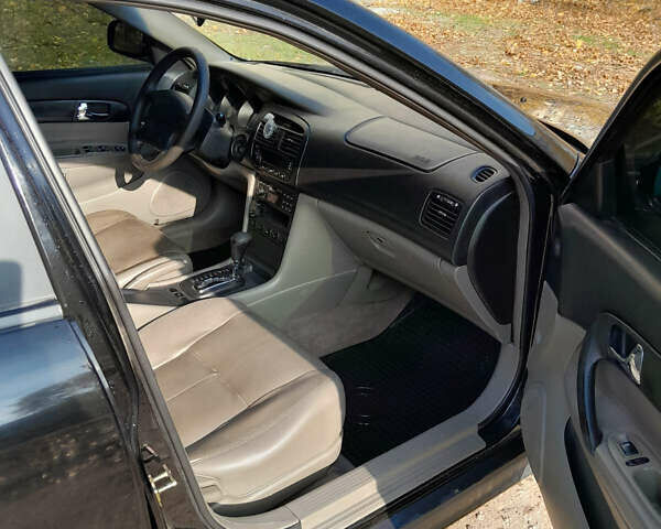 Черный Шевроле Эванда, объемом двигателя 2 л и пробегом 260 тыс. км за 4150 $, фото 4 на Automoto.ua