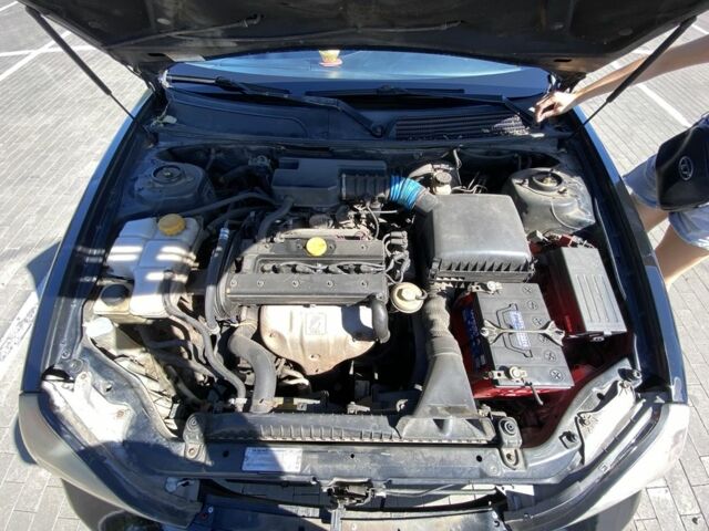 Черный Шевроле Эванда, объемом двигателя 2 л и пробегом 266 тыс. км за 3600 $, фото 23 на Automoto.ua