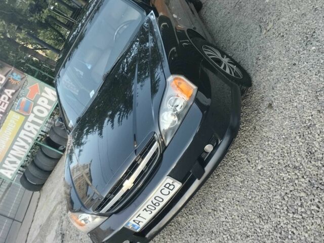 Чорний Шевроле Еванда, об'ємом двигуна 2 л та пробігом 36 тис. км за 3600 $, фото 4 на Automoto.ua