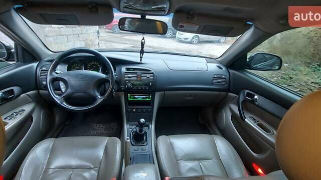 Черный Шевроле Эванда, объемом двигателя 2 л и пробегом 220 тыс. км за 4000 $, фото 10 на Automoto.ua