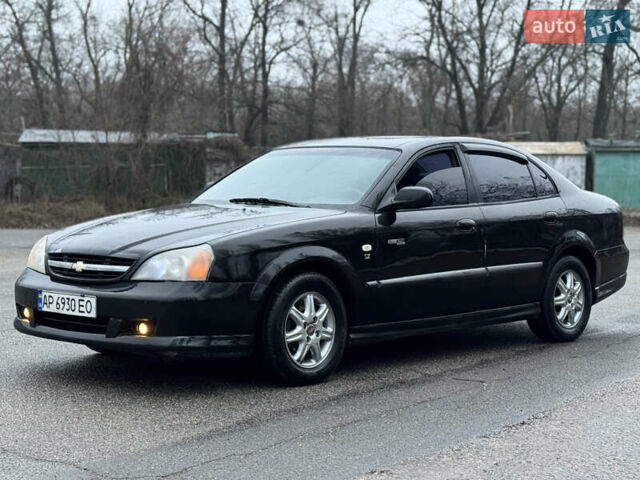 Чорний Шевроле Еванда, об'ємом двигуна 2 л та пробігом 303 тис. км за 2950 $, фото 1 на Automoto.ua