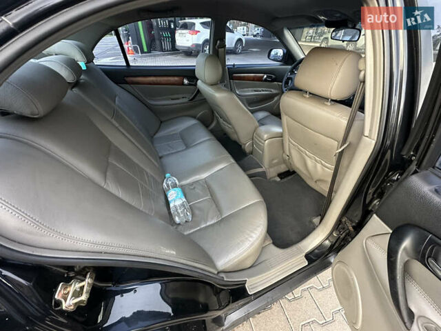 Черный Шевроле Эванда, объемом двигателя 2.5 л и пробегом 165 тыс. км за 3499 $, фото 17 на Automoto.ua