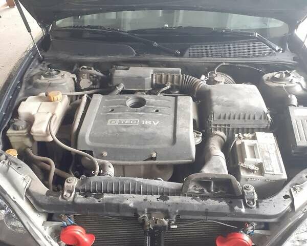 Черный Шевроле Эванда, объемом двигателя 2 л и пробегом 200 тыс. км за 3800 $, фото 2 на Automoto.ua