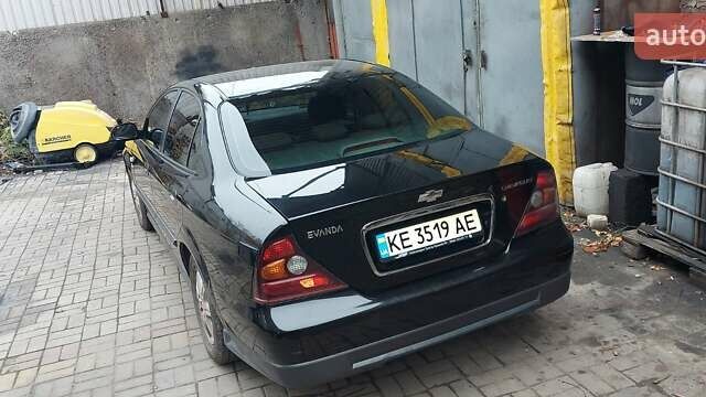 Черный Шевроле Эванда, объемом двигателя 2 л и пробегом 220 тыс. км за 4000 $, фото 5 на Automoto.ua