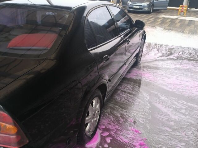 Черный Шевроле Эванда, объемом двигателя 2 л и пробегом 180 тыс. км за 3000 $, фото 8 на Automoto.ua