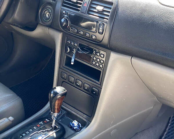 Черный Шевроле Эванда, объемом двигателя 2 л и пробегом 266 тыс. км за 3600 $, фото 4 на Automoto.ua