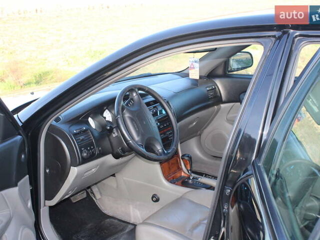 Черный Шевроле Эванда, объемом двигателя 0 л и пробегом 170 тыс. км за 4500 $, фото 8 на Automoto.ua