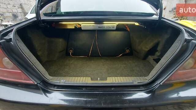 Черный Шевроле Эванда, объемом двигателя 2 л и пробегом 220 тыс. км за 4000 $, фото 16 на Automoto.ua