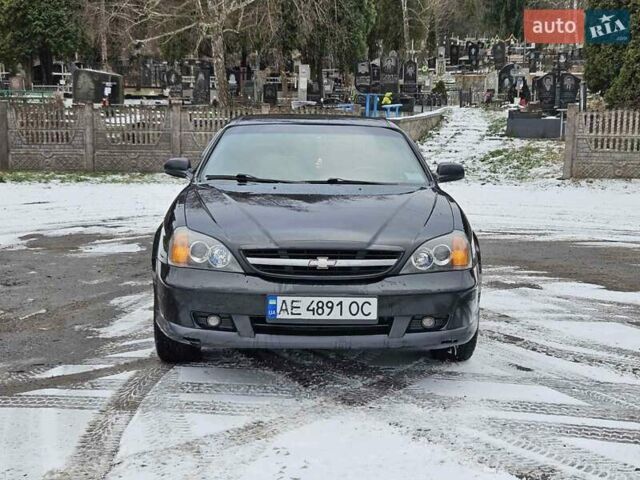 Чорний Шевроле Еванда, об'ємом двигуна 2 л та пробігом 250 тис. км за 3500 $, фото 17 на Automoto.ua